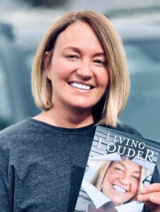 portia louder holding her book